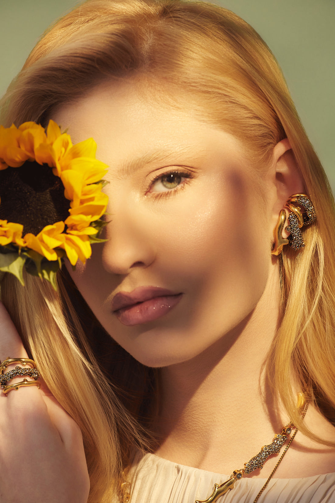 BRINCO GIRASSOL CAULE CRAV ENCAIXE DUPLO OURO