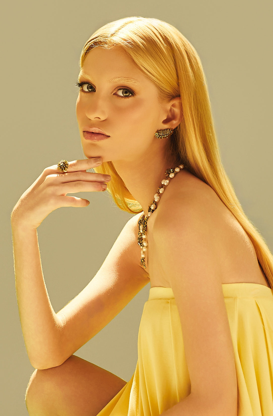 ANEL GIRASSOL P BOTÃO STRASS PRATA